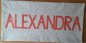 Preview: Namenskissen Alexandra bunte Tupfen Namen einfarbig 40x80