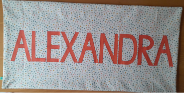 Namenskissen Alexandra bunte Tupfen Namen einfarbig 40x80